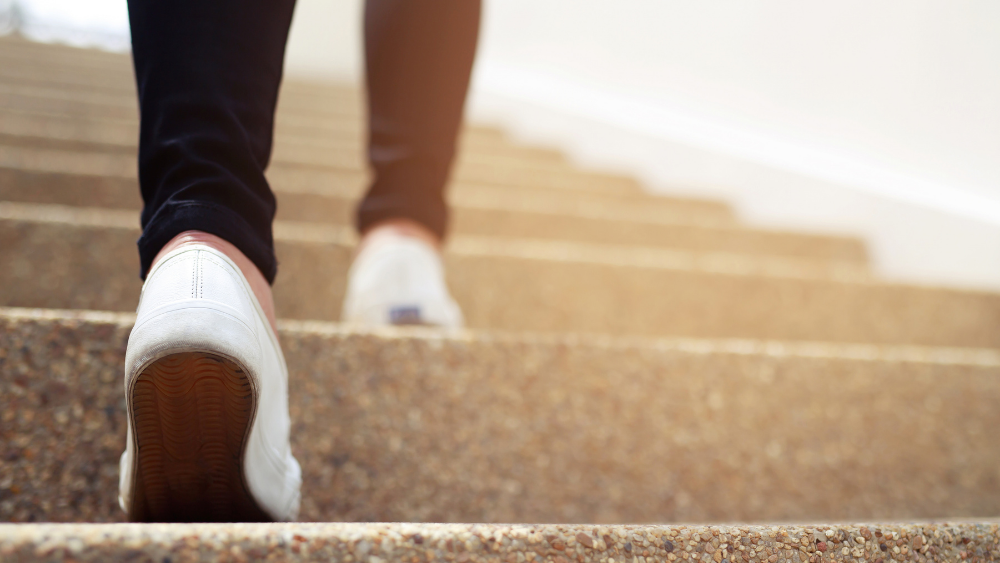 Funcionalities person climbing stairs